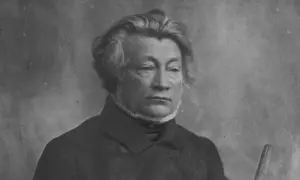 Portret mężczyzny w ciemnym stroju, z burzą siwych włosów. Czy to on, co napisał Adam Mickiewicz?