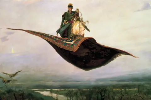 Młody mężczyzna w orientalnym stroju, kto lata na dywanie, trzymając latarnię, przelatuje nad krajobrazem.