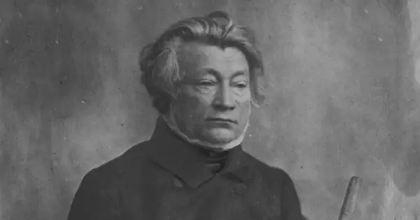 Portret mężczyzny w ciemnym stroju, z burzą siwych włosów. Czy to on, co napisał Adam Mickiewicz?